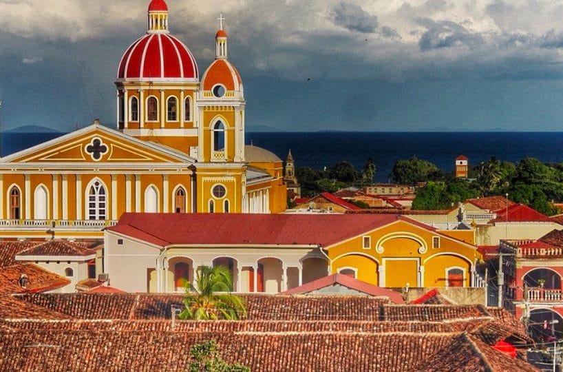 Yellow cathedral and red-tiled rooftops of colonial Granada, Nicaragua