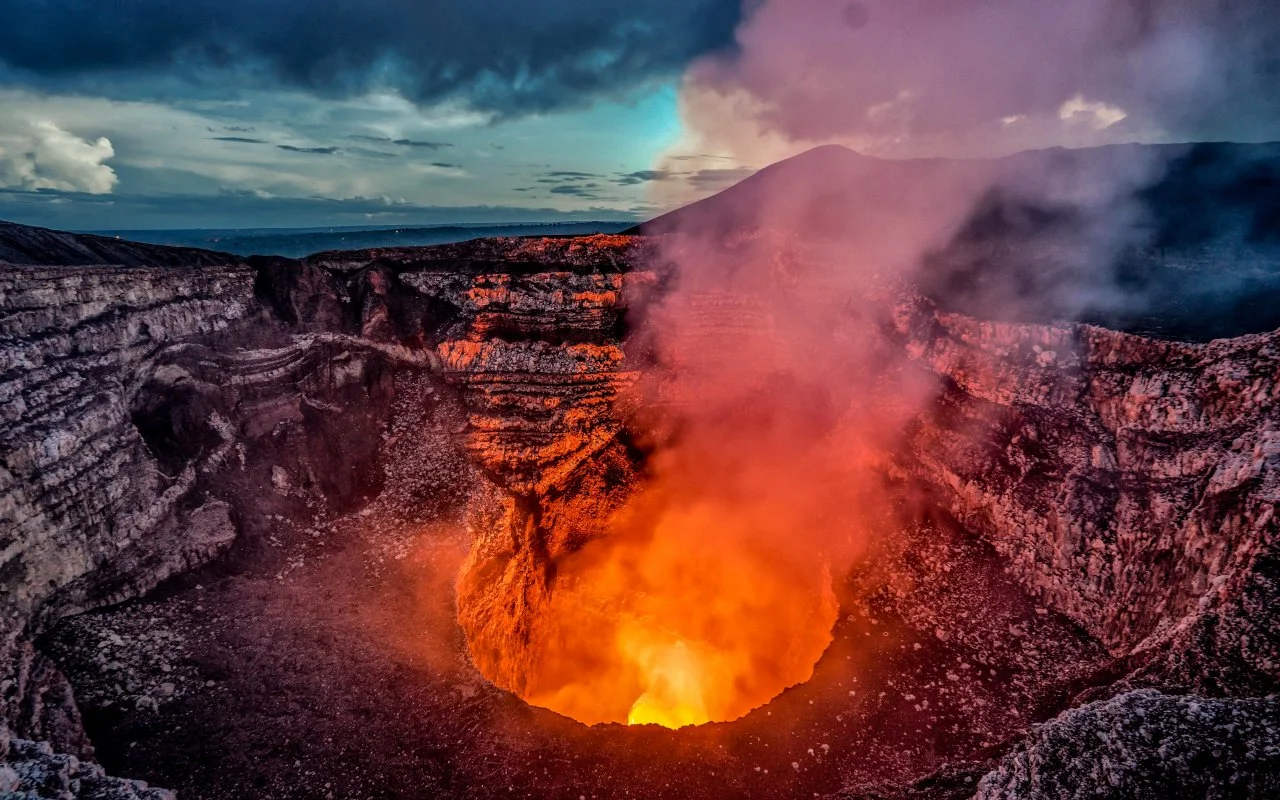 Glowing lava and gas rising from the Santiago crater of Masaya Volcano, Nicaragua